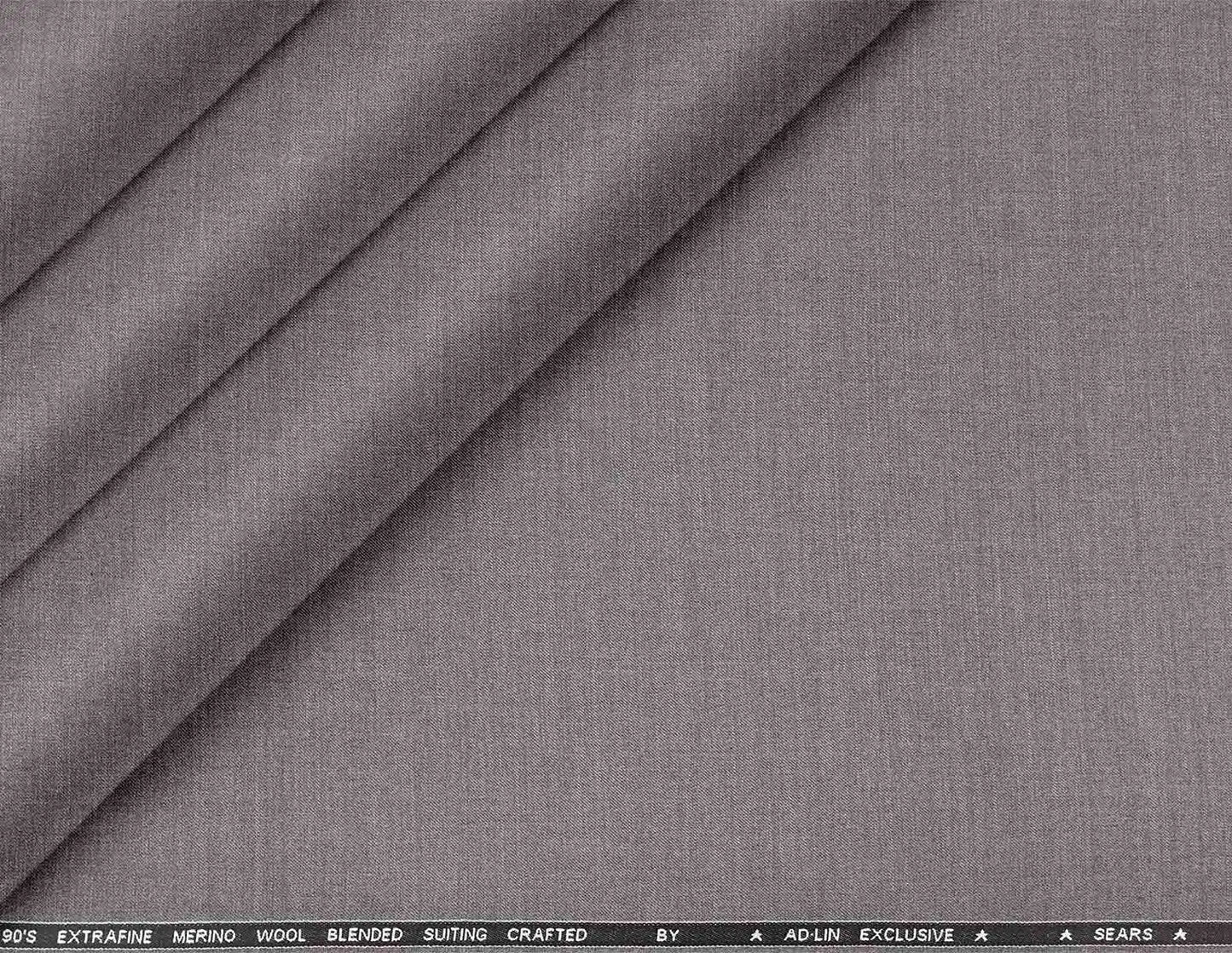 Super 90’s extrafine merino wool blended suiting in a refined plain micro-structure, ideal for sharp, modern poly-wool tailoring in versatile grey.