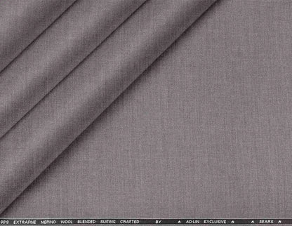 Super 90’s extrafine merino wool blended suiting in a refined plain micro-structure, ideal for sharp, modern poly-wool tailoring in versatile grey.