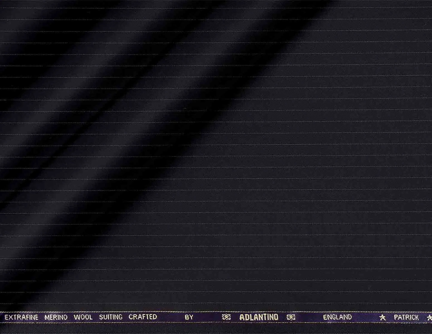 "Patrick Super 120’s Extrafine Merino Wool Plain Black Suiting by Adlantino"