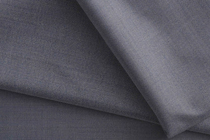 Mid Grey Herringbone Super 90’s Poly Wool Suiting Fabric for Jodhpuri Suits, Koti and Jackets.officinepaladino+1