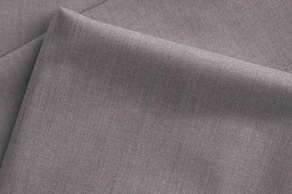 Super 90’s extrafine merino wool blended suiting in a refined plain micro-structure, ideal for sharp, modern poly-wool tailoring in versatile grey.